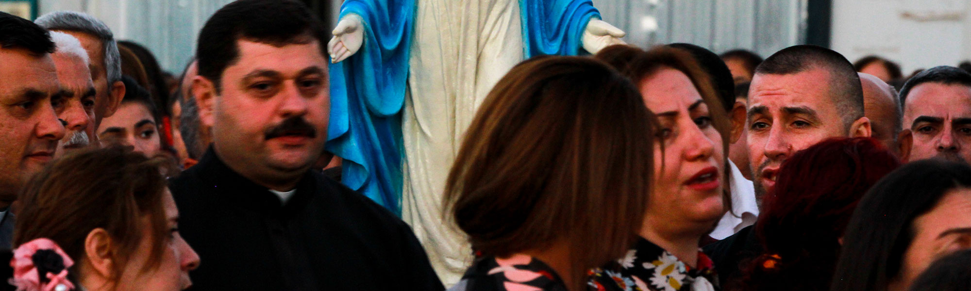 Erbil, Iraq refugee camp, early evening mass and Marian procession on the feast of the Visitation of the Blessed Virgin Mary