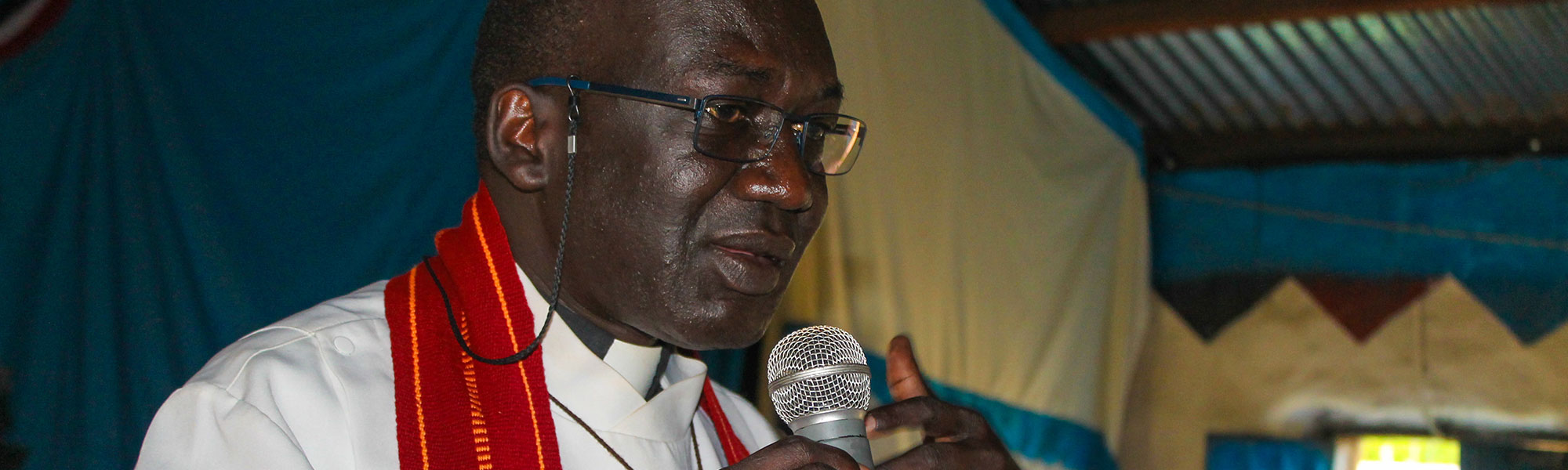 Rev. John Chol Daau preaches on Palm Sunday at St. Luke's Episcopal Church in Munuki, South Sudan